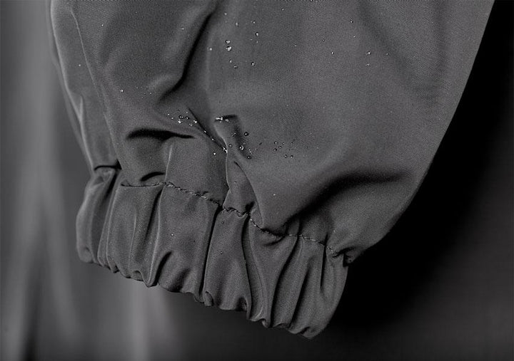 Women's Oversized Rain Jacket with Hood Button Front and Pockets