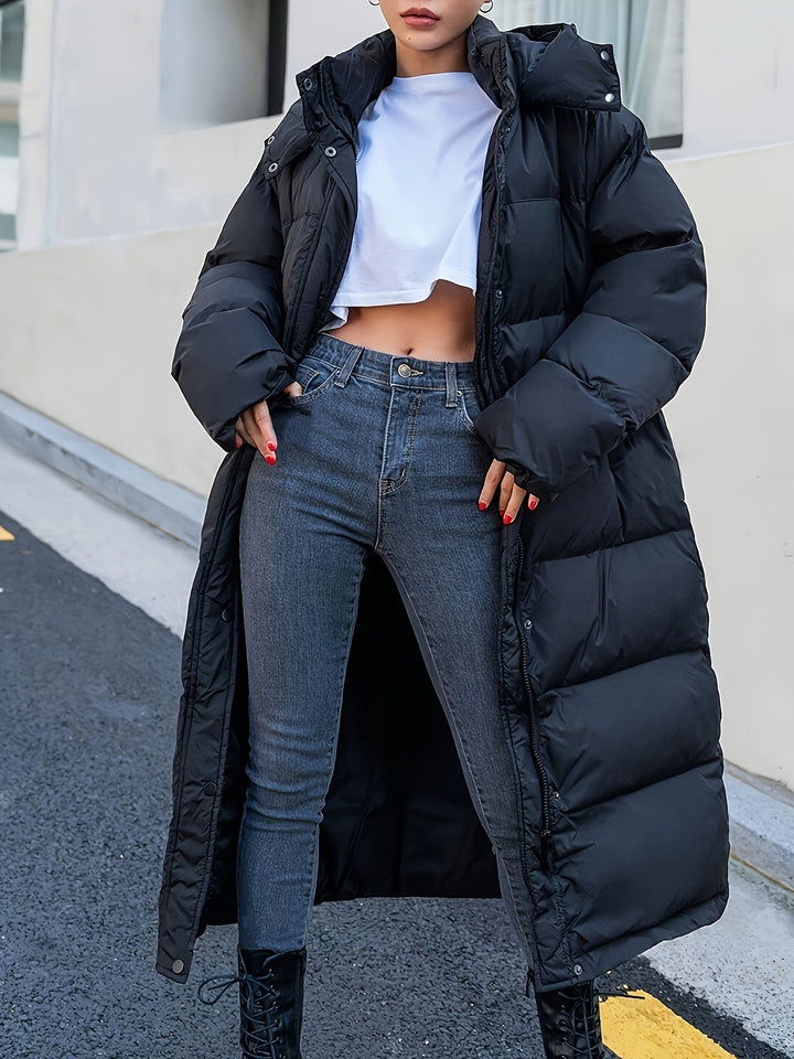 Women's Long Black Puffer Jacket with Hood and Full-Length Quilted Design